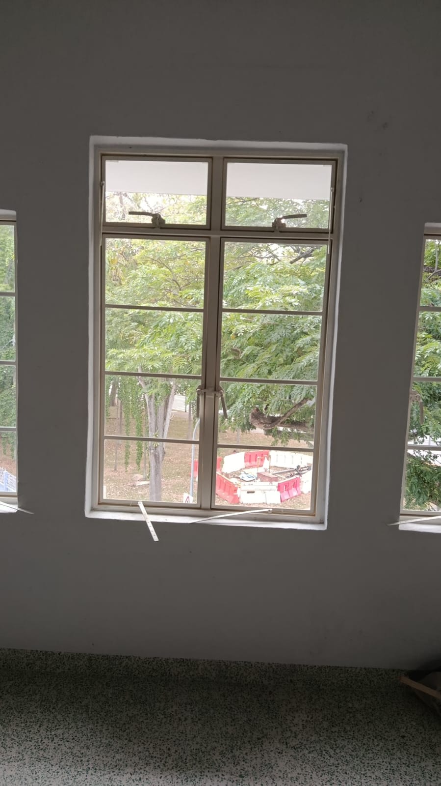 White framed window with divided glazing at Guan Chuan
